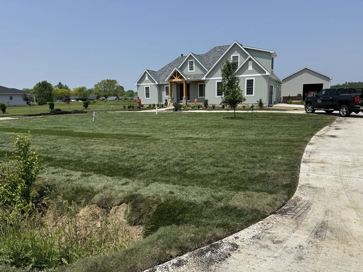 Installed lawn viewed across the front of the home