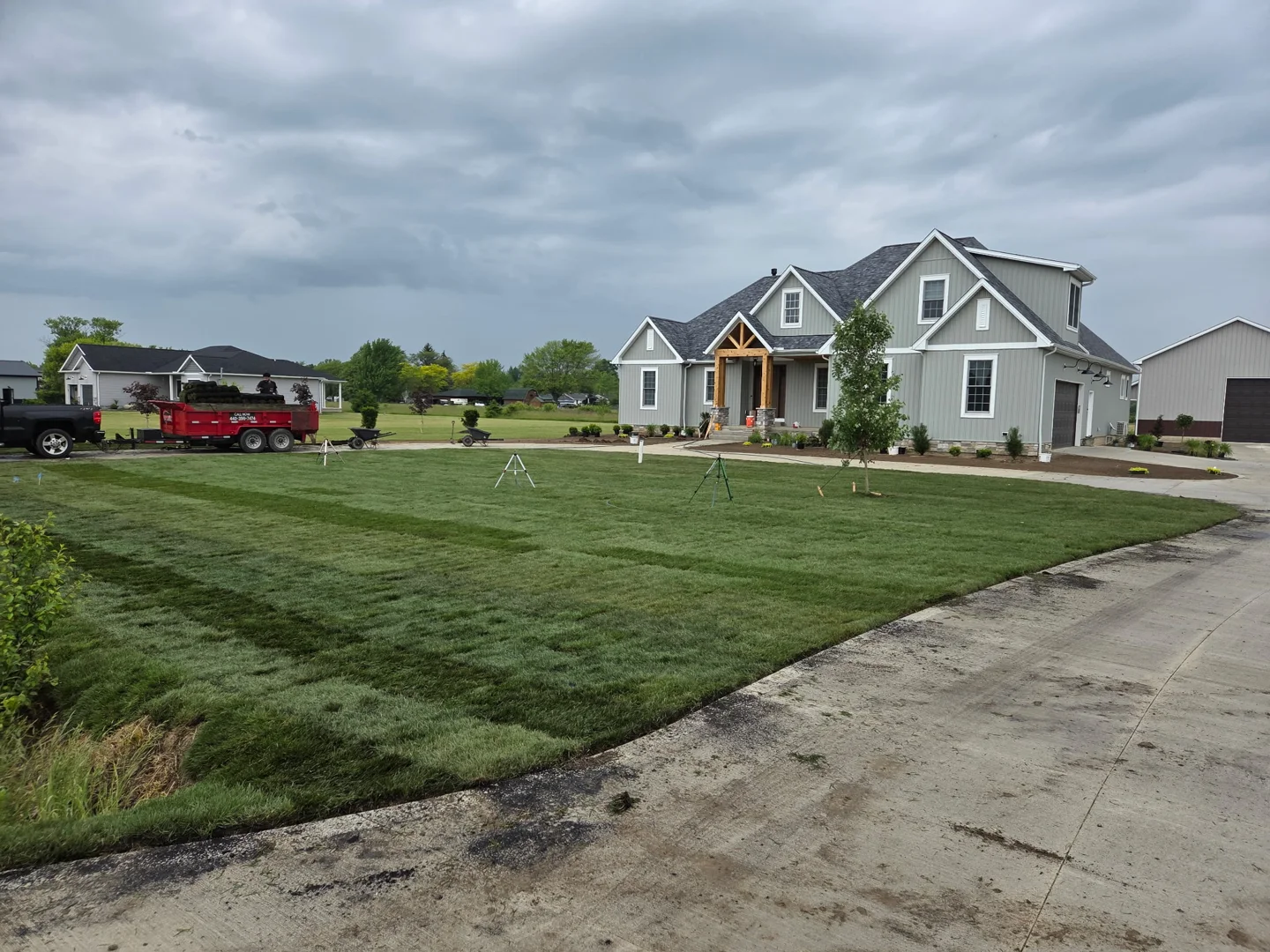 A freshly installed YardBros lawn surrounding a Northeast Ohio home